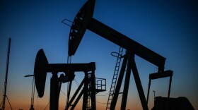 Oil pumpjacks operate at dusk Willow Springs Park in Long Beach, California on April 21, 2020, a day after oil prices dropped to below zero as the oil industry suffers steep falls in benchmark crudes due to the ongoing global coronavirus pandemic. (APU GOMES/AFP via Getty Images)
