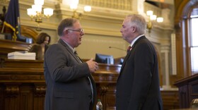 State Rep. Dan Hawkins, left, talks with the man he's replacing as House majority leader, Rep. Don Hineman