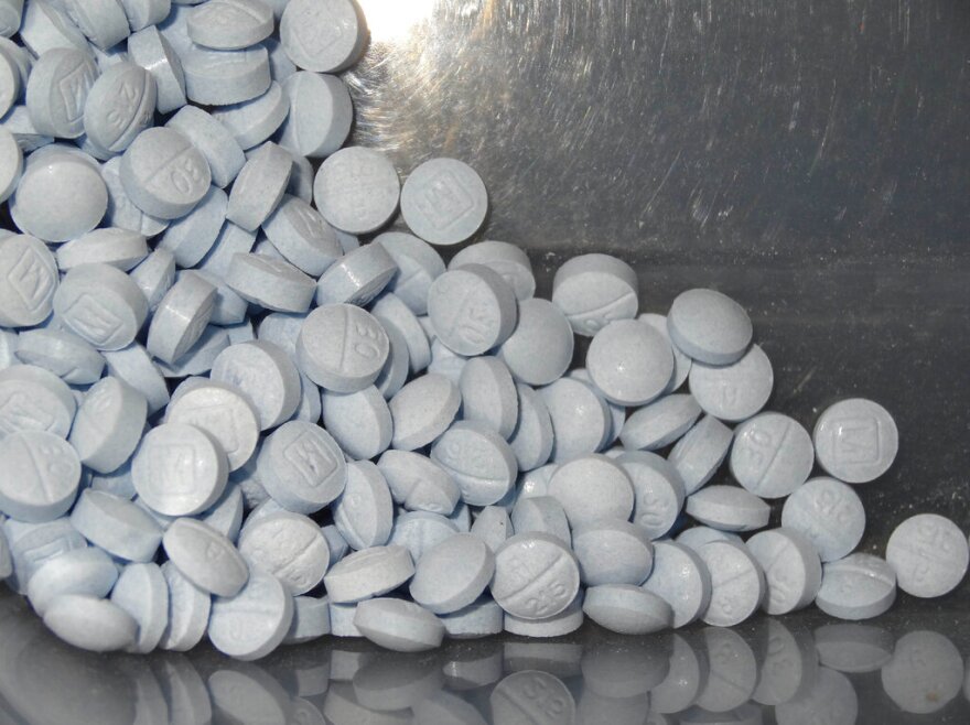 FILE - This undated file photo provided by the U.S. Attorneys Office for Utah and introduced as evidence at a trial shows fentanyl-laced fake oxycodone pills collected during an investigation. Accidental overdoses contribute to 90 percent of all U.S. opioid-related deaths. Rising use of illicitly manufactured and highly potent synthetic opioids including fentanyl has likely contributed to the unintentional death rate, which surged nine-fold between 2000 and 2017, a study found.