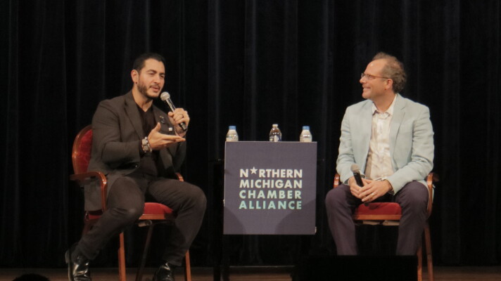 Democratic Senate candidate Abdul El-Sayed (left) speaks with Kyle Melinn of MIRS (right) at a campaign forum in Traverse City on September 21st, 2026