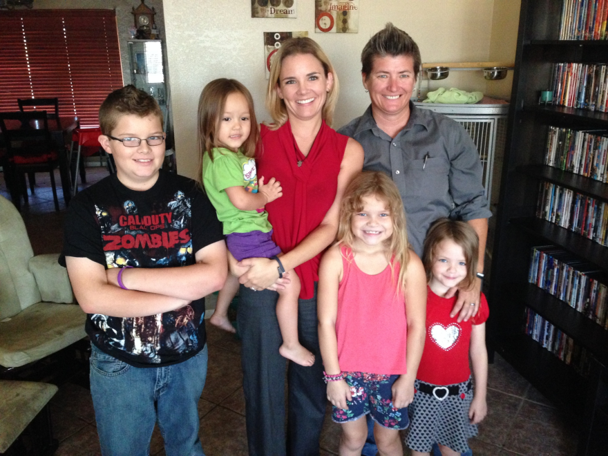 Melanie Puskar-Blakely (left) and Tonya Blakely at home with their family in Glendale, Ariz.