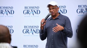 Urban CEO Alfred Liggins addresses supporters at a block party organized by his company and Churchill Downs, Richmond, Va., Sept. 30, 2023. The two companies are urging voters to approve a $562 million resort casino in Virginia's state capital.