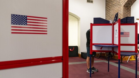 A man votes in the election at a polling place at Alexandria City Hall, in Alexandria, Va., Tuesday, Nov. 7, 2023.