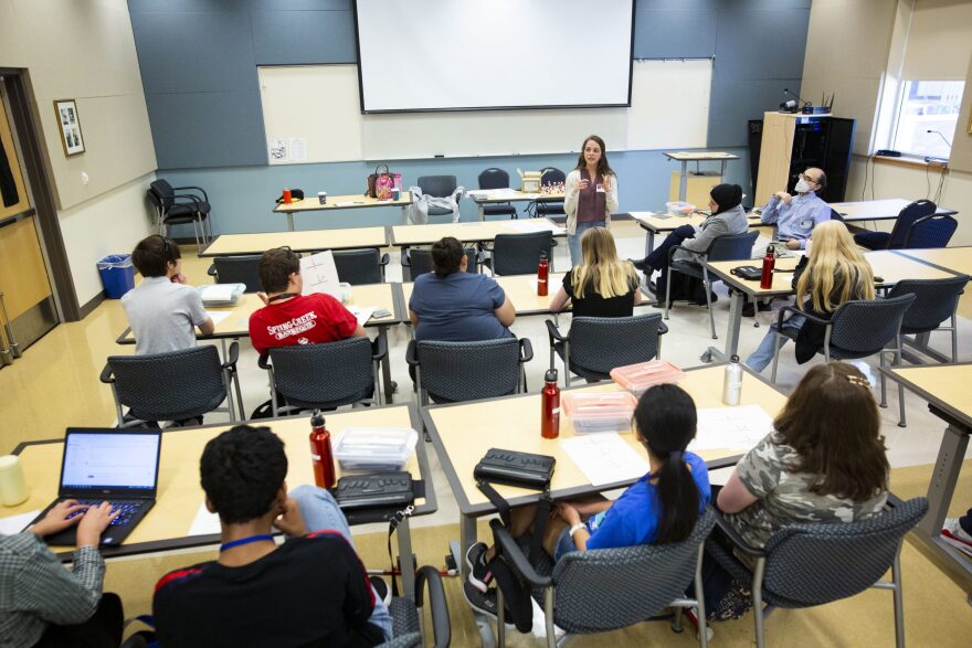 Emily Alonzo speaks to a group of students at the Texas School for the Blind and Visually Impaired as part of the In Your Element program teaching chemistry and hard sciences to visually impaired students in Austin on Oct. 10, 2022.