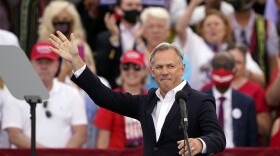 Republican North Carolina gubernatorial candidate Dan Forest appears a campaign rally ahead of the arrival of President Donald Trump Tuesday, Sept. 8, 2020, in Winston-Salem, N.C. Forest said on Wednesday, Sept. 16, 2020 that he would immediately reopen all K-12 public schools without requiring students or teachers to wear masks if he were governor.