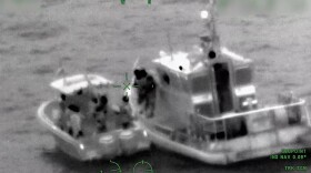 U.S. Coast Guard boat crew, right, rescued eight boaters on their disabled vessel in the Gulf off the coast of Venice on Saturday.