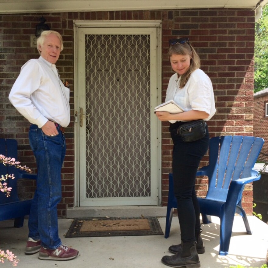 A man and woman on a porch at a house in Detroit