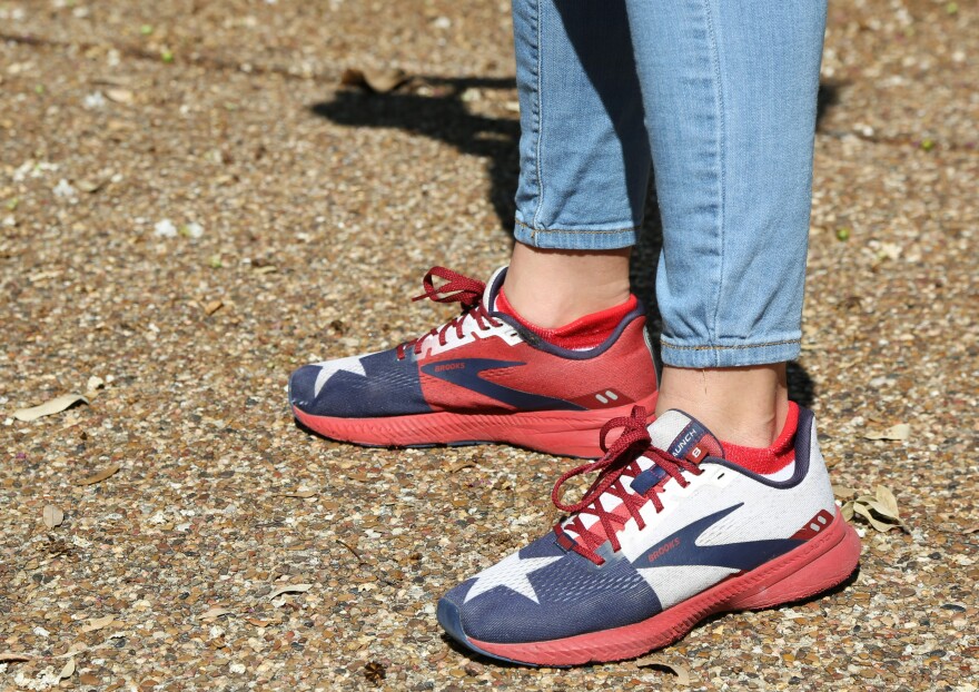 Democrat Mihaela Plesa wears a pair of Brooks Texas flag running shoes on her block walks. She's running to represent House District 70, which includes parts of Plano.