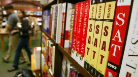 SAT test preparation books sit on a shelf at a Barnes and Noble. (Mario Tama/Getty Images)