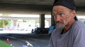 Jeffrey Hill's tent burned down in an encampment fire in late May 2017. The cause of the fire is not known. Hill calls his encampment at Fifth and Brush streets a "family," but also says it has become harder to maintain order as the encampment has grown in size. (Devin Katayama/KQED)