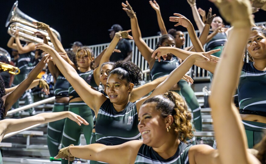 Students from Charles W. Flanagan High School's marching band, The Falcon Sound, perform in 2025.