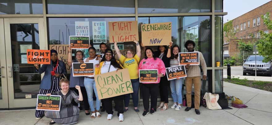 Members of the Sierra Club and other groups gather outside the Washington Park Library, prior to the PSC public input session.