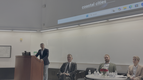 Juan Mullerat, the principal of urban planning department Plusurbia Design, speaks at a panel on sea level rise at the University of Miami's Perez Architecture Center Friday, Sept. 4, 2026.