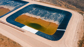An aerial view of produced water ponds, used to treat and recycle wastewater from fracking, in Lenorah, Texas.