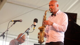 Miguel Zenón performs with his Puerto Rican Songbook group, including Luis Perdomo on piano (left), on the Quad stage during the Newport Jazz Festival.