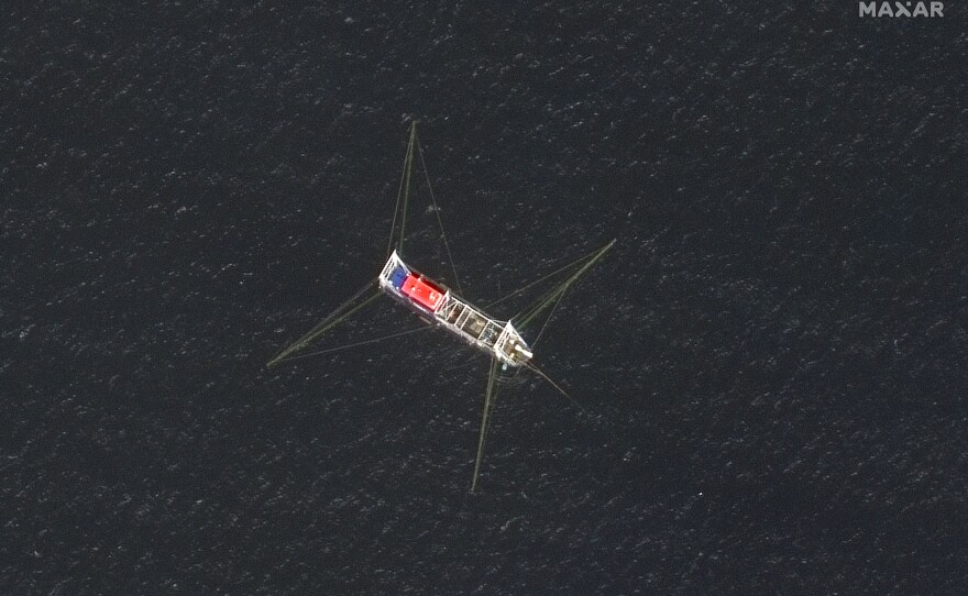 View of a fishing trawler moored off of Whitsun Reef on March 23, 2021. The Chinese insist that the nearly 200 boats observed around the reef are strictly fishing vessels that had massed only to shelter from rough seas.