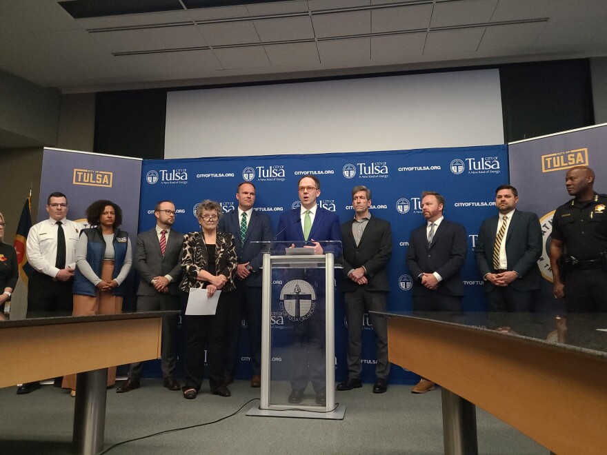 Tulsa Mayor G.T. Bynum, center, flanked by other city leaders during a press conference on April 9, 2024.