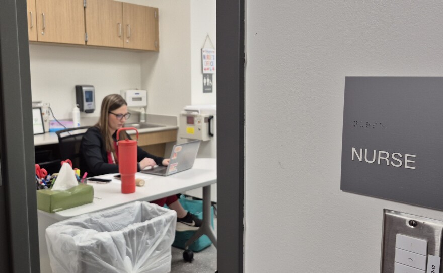 The school nurse's office is right next to Western Elementary School's main office. She could be seen helping students just after the first bell rang on Tuesday.