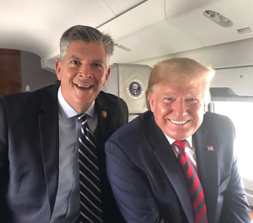 U.S. Rep. Darin LaHood, left, with President Trump on Monday aboard Air Force One.