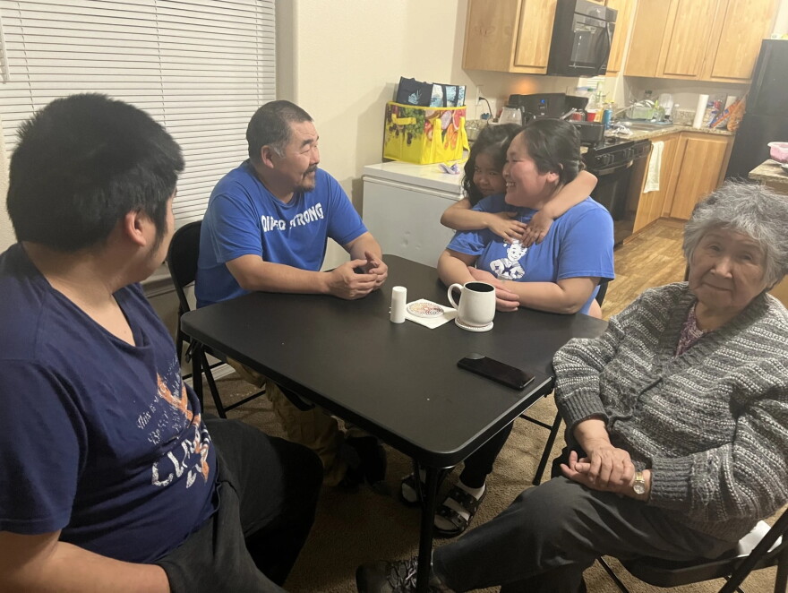 By January 2026, the John family had finally moved into a home in Muldoon. They were especially glad to sit together at their own table, even if it was just a folding table. After months of living in shelters and a cramped hotel room, with no place to eat and just a refrigerator and microwave, they were thrilled to be able to cook and enjoy meals once again as a family.
