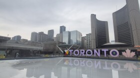 A wide shot of Downtown Toronto in front of city hall.