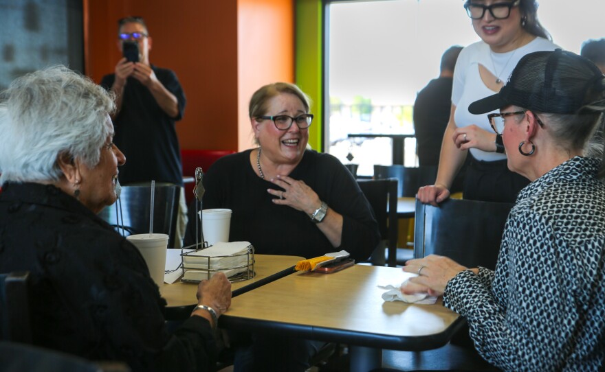 Andrea Huff (center) and her daughter, Anabelle,