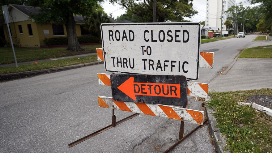 A city street is closed this month for repairs and upgrades in Orlando, Fla. As part of an infrastructure proposal by the Biden administration, $115 billion is earmarked to modernize bridges, highways and roads.