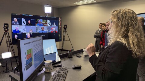 ODU's Board of Visitors toured classrooms outfitted with updated technology in December. This technology, including larger screens, lighting and high-quality cameras, is part of the university's digital transformation plan.