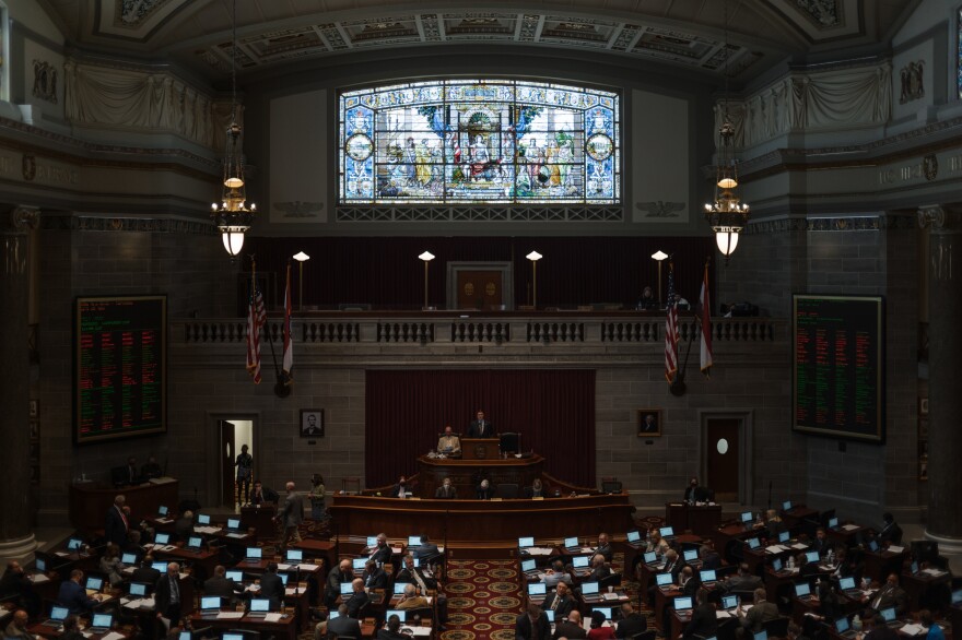 Members of the Missouri State House vote on March 31 in Jefferson City, Mo. The divide over voting rights is not new, but the sides have become increasingly entrenched.