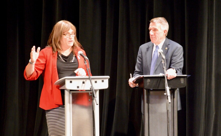 Democratic challenger Christine Hallquist and Republican incumbent Gov. Phil Scott argued over how best to lead Vermont Wednesday at Rutland's Paramount Theatre on stage.