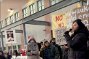Organizer Fernanda Jimenez addresses people at an emergency protest in front of Milwaukee's ICE office on Wednesday January 28, 2026.