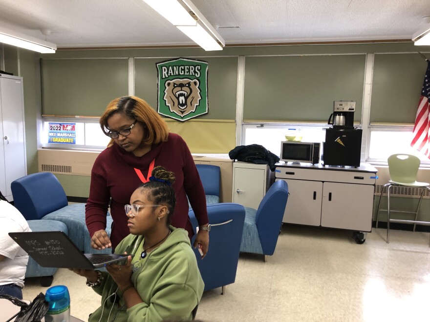 Milwaukee Marshall College and Career Center advisor Parice Beckley helps student Tamia Willis fill out a college application in fall 2022.