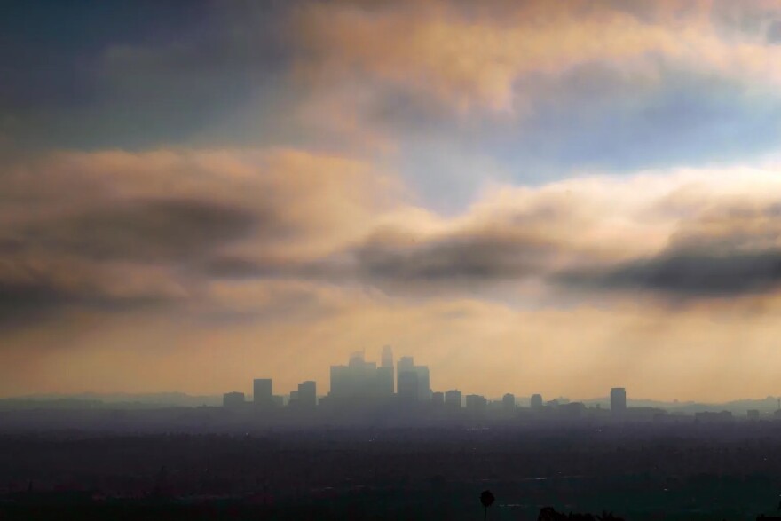 Downtown Los Angeles is shrouded in early morning coastal fog and smog.