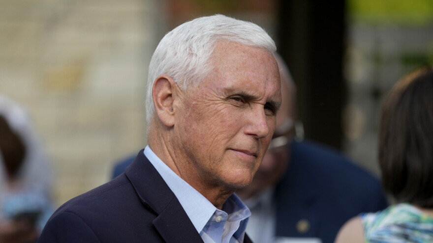 Former Vice President Mike Pence talks with local residents during a meet and greet on May 23, 2023, in Des Moines, Iowa. Pence will officially launch his widely expected campaign for the Republican nomination for president in Iowa on June 7.