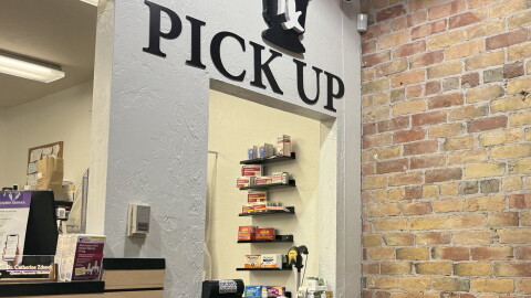 The pickup counter at Downtown Drug in Glenwood Springs sits empty for a moment on Sept. 5, 2026. The busy pharmacy has been working to fill estrogen patch prescriptions during a nationwide shortage.