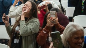 People celebrate after passage of the National Defense Authorization Act by the U.S. Senate, during a watch party hosted by the Lumbee Tribe of North Carolina, Wednesday, Dec. 17, 2025, in Pembroke, N.C.