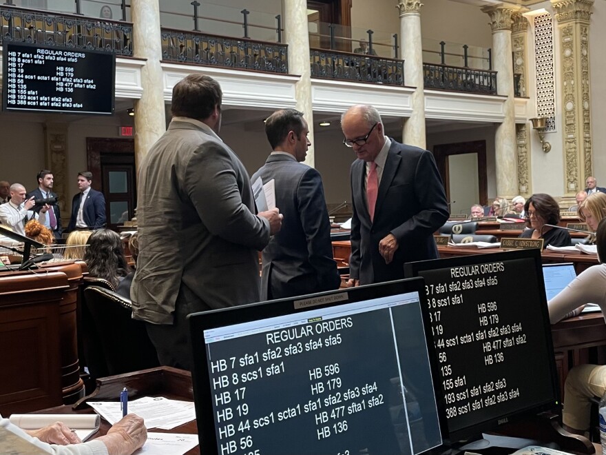 Kentucky Senate Budget Committee Chair Chris McDaniel speaks with fellow northern Kentucky Senator John Schickel