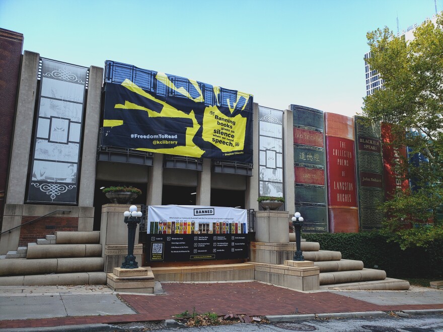 The "Community Bookshelf" installation on the wall of the Kansas City Public Library's Central location features 42 classic titles. A third of them have been banned or challenged.