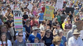 Thousands of protesters stood outside