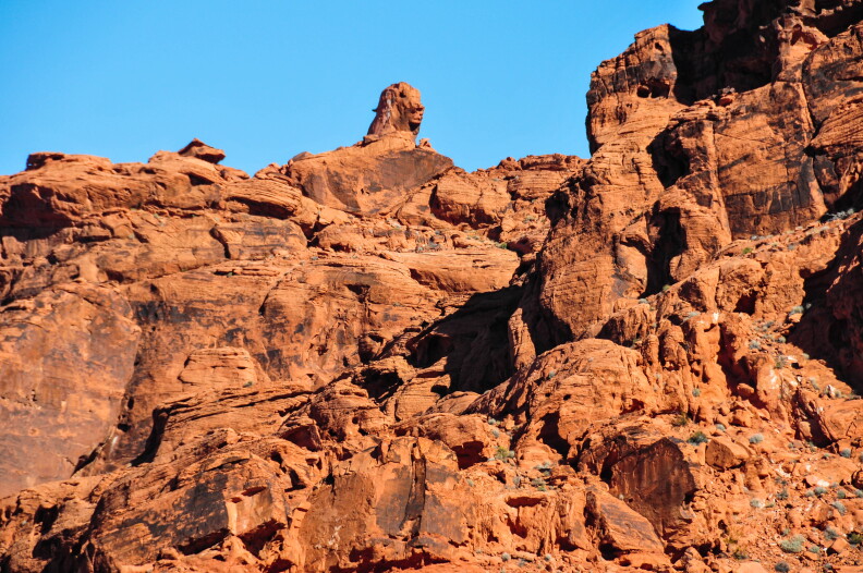 A climbing area made of red rocks.