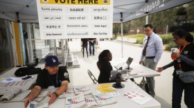 California holds early voting at a new LA County mobile vote center on Feb. 27 in Los Angeles. The state's presidential primary is on Super Tuesday, March 3. Mario Tama/Getty Images