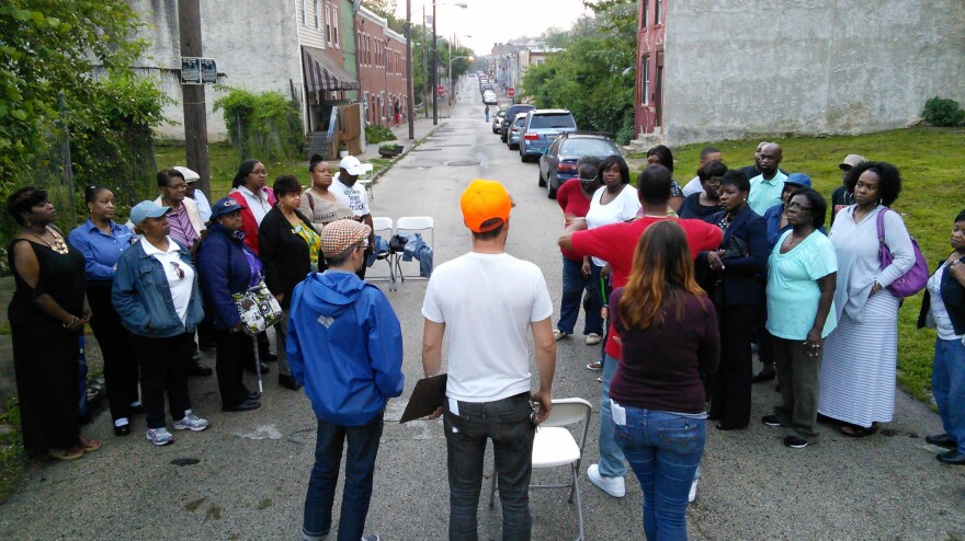 Members of the Mt. Olive Baptist Church choir practice on Melon Street in Mantua for their role in the funeral — or rather, the 'homegoing.'