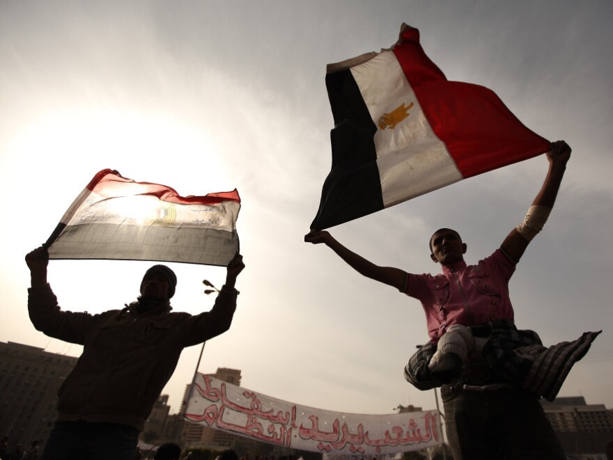 Anti-government protestors waving Egyptian flags in Tahrir Square in Cairo, Egypt. This past fall, a group of senators tried to pass a resolution to push Egyptian President Hosni Mubarak for a free and fair Egypt.