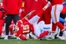 Kansas City Chiefs quarterback Patrick Mahomes (15) is injured after being tackled by Los Angeles Chargers defensive tackle Da'Shawn Hand (91) during the second half of an NFL football game, Sunday, Dec. 14, 2025 in Kansas City, Mo.