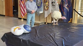 North Dakota Turkey Federation president David Rude, and 'Henrietta"