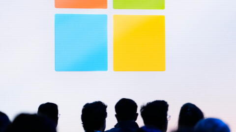 People attend a showcase event of the company's artificial intelligence assistant, Copilot, ahead of the annual Build developer conference at Microsoft headquarters, Monday, May 20, 2024, in Redmond, Washington. (Lindsey Wasson/AP)