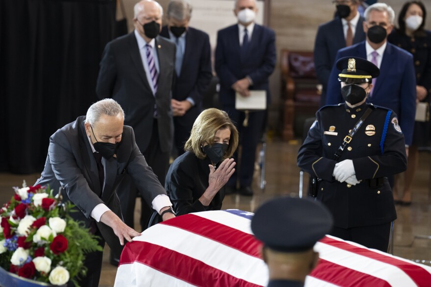 House Speaker Nancy Pelosi and Senate Majority Leader Charles Schumer pay their respects at Harry Reid's casket.