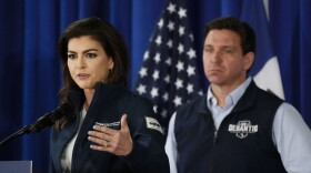 FILE - Florida first lady Casey DeSantis speaks as her husband Republican presidential candidate Florida Gov. Ron DeSantis looks on during a campaign event, Wednesday, May 31, 2023, in Cedar Rapids, Iowa.