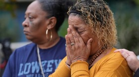 Bernice Bass, left, and Teresa Spivey, family members of Patrice Williams, who was hosting a party for her daughter where gunfire broke out, react while being interviewed in Stockton, Calif., Monday, Dec. 1, 2025.
