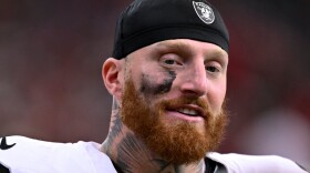 FILE - Las Vegas Raiders defensive end Maxx Crosby (98) looks on during the first half of an NFL football game against the Houston Texans, Dec. 21, 2025, in Houston. (AP Photo/Maria Lysaker, File)